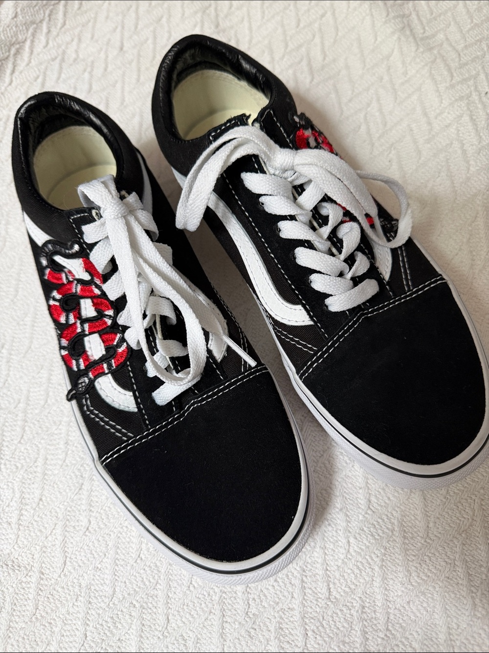 Vans Black and White Low-Top Sneakers with Red Snake Accent